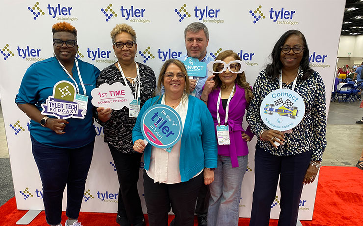 Attendees from Richland County School District 1 in South Carolina sharing their excitement about Connect 2024 during a red-carpet interview in the media hub